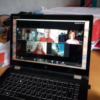 Group discussion on laptop
