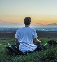 Meditation looking over city