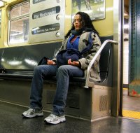 Woman meditating on train